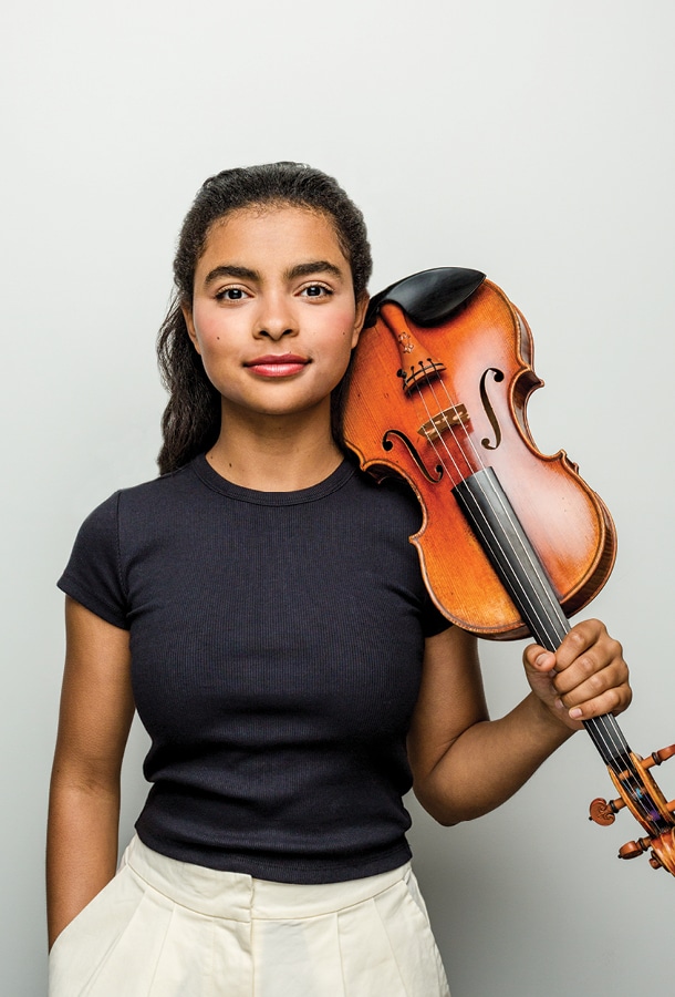 Amaryn Olmeda holds violin in headshot