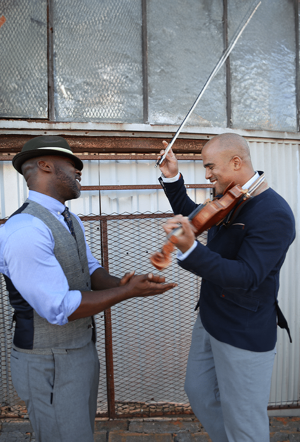 Marc Bamuthi Joseph, arts activist & spoken word artist and Daniel Romain, composer/violinist