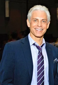 Photo of Steven Caras smiling