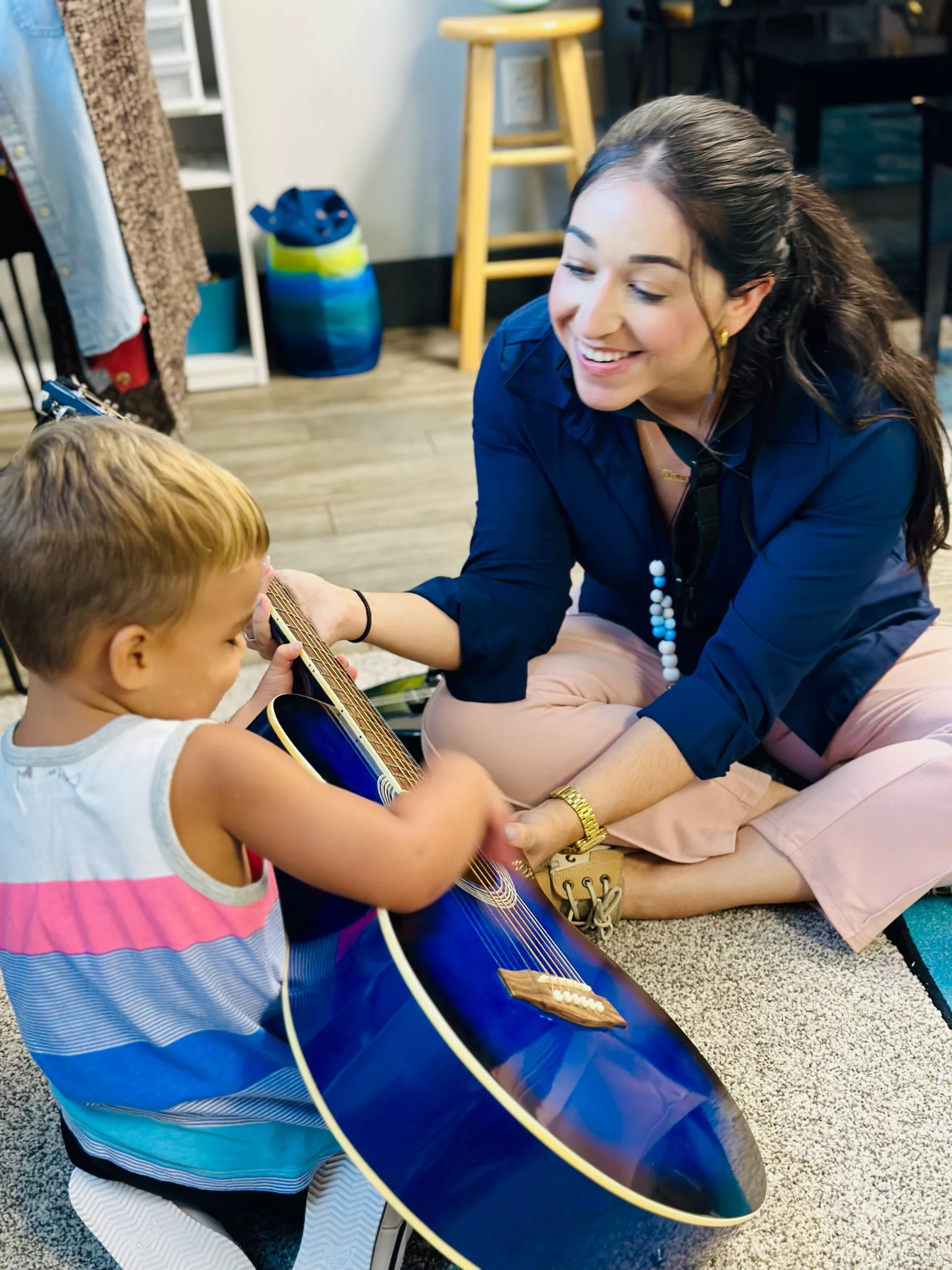 women playing with child