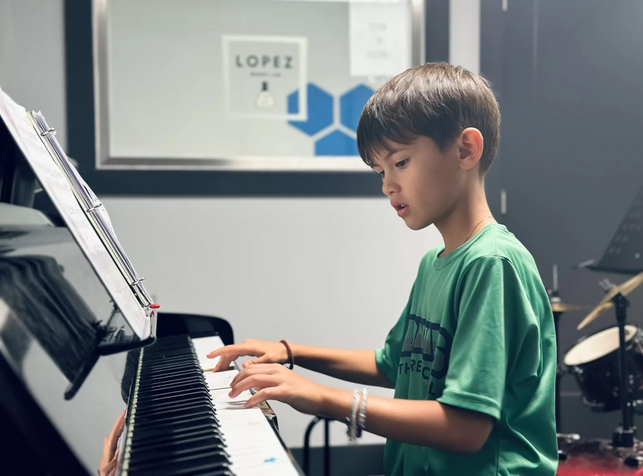 boy playing keyboard