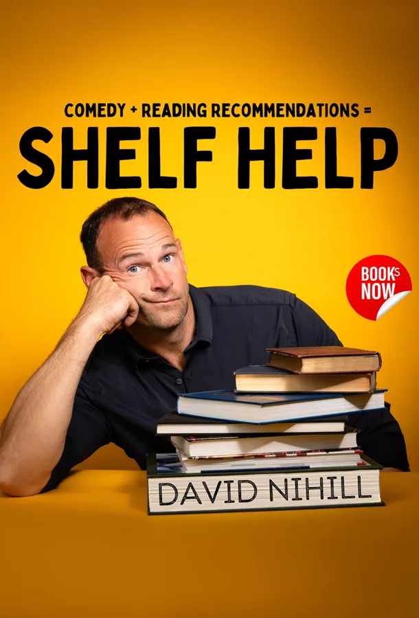 David Nihill overlooking books with text of COMEDY, READING RECOMENTATIONS SHELF HELP