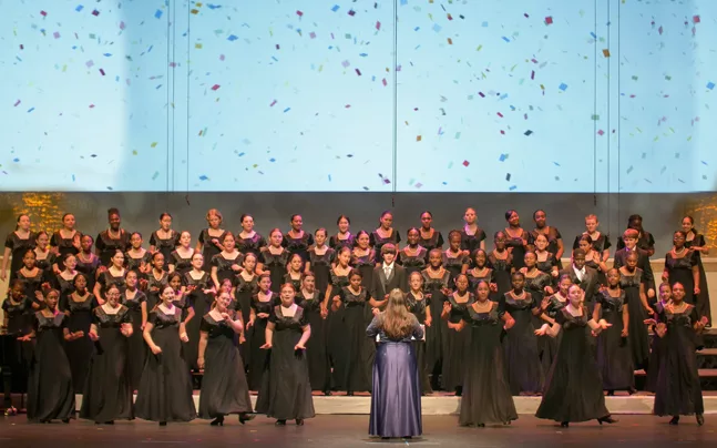 kids performing on stage